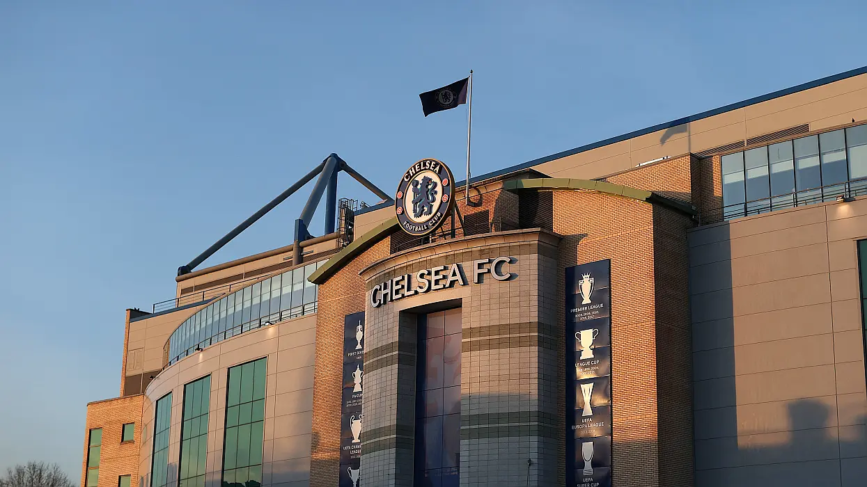 The Chelsea FC sign hangs over Stamford Bridge, its home stadium
