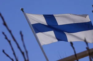 The flag of Finland against a blue sky
