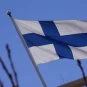 The flag of Finland against a blue sky