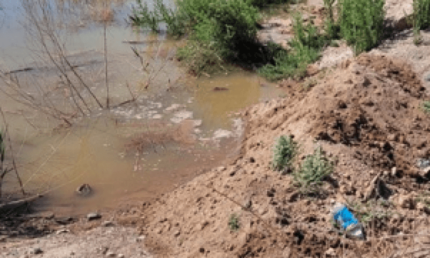 Contaminated water after a spill at a sewage treatment plant 