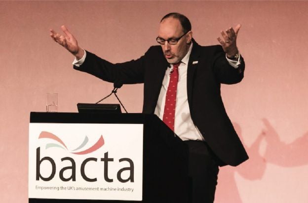 Bacta CEO John White giving a presentation