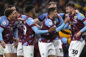 Burnley FC players on the field during a game