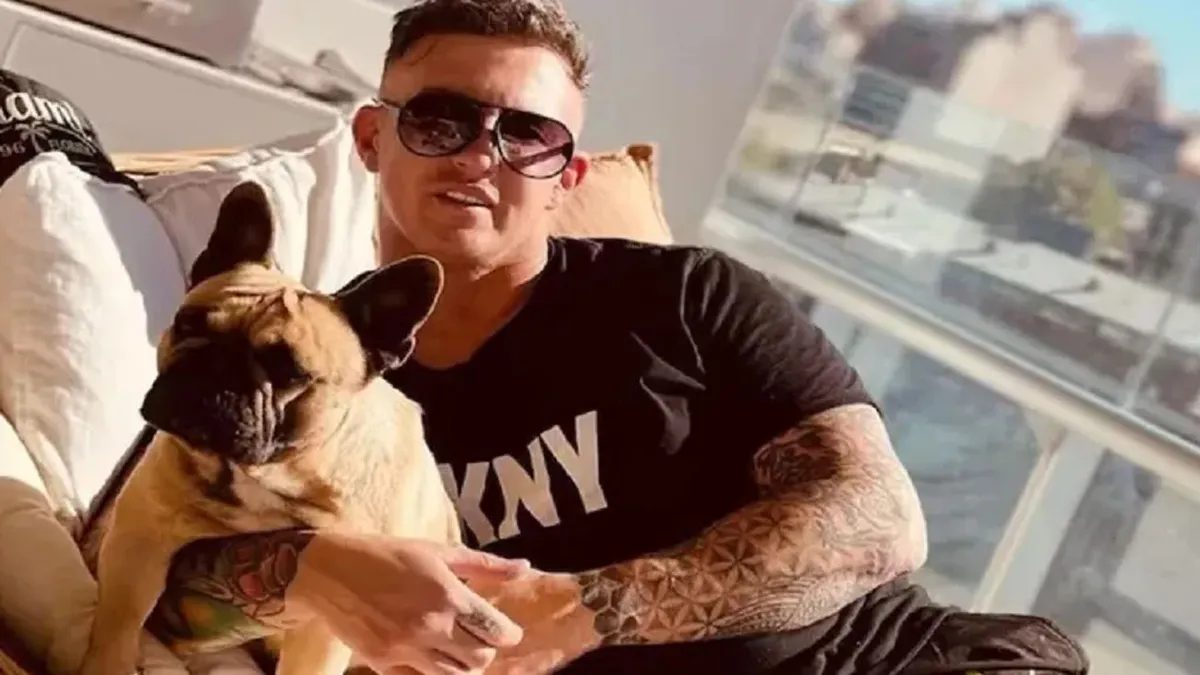 Fernando Pérez Algaba in a social media post with one of his dogs