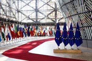 Flags of EU countries fly in the EU headquarters in Brussels, Belgium