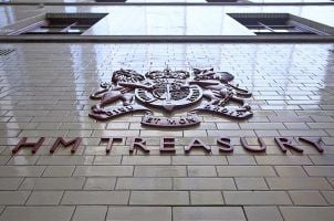 The sign and logo of HM Treasury on its building in London
