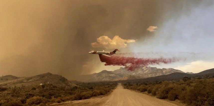 A tanker drops fire retardant