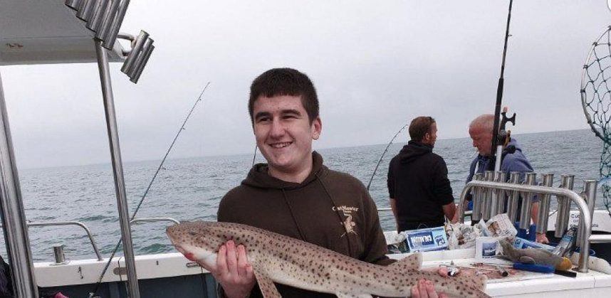 Arion Kurtaj on a fishing boat