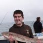 Arion Kurtaj on a fishing boat