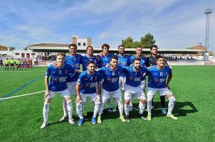 Members of the Spanish soccer team Huracán de Melilla pose for a team photo