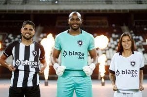 Players with Brazilian soccer club Botafogo show off Blaze as their new sponsor