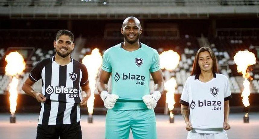 Players with Brazilian soccer club Botafogo show off Blaze as their new sponsor
