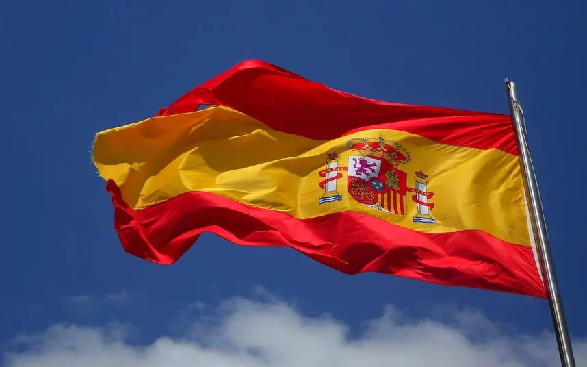 The Spanish flag flying on a pole