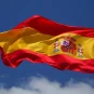 The Spanish flag flying on a pole