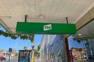 A Tab betting sign outside a shop in Northcote, Victoria, Australia