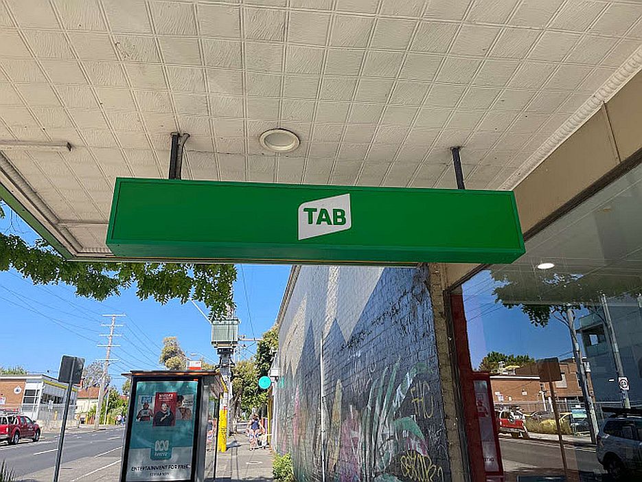 A Tab betting sign outside a shop in Northcote, Victoria, Australia