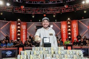 Daniel Weinman shows off his winnings from the 2023 WSOP Main Event
