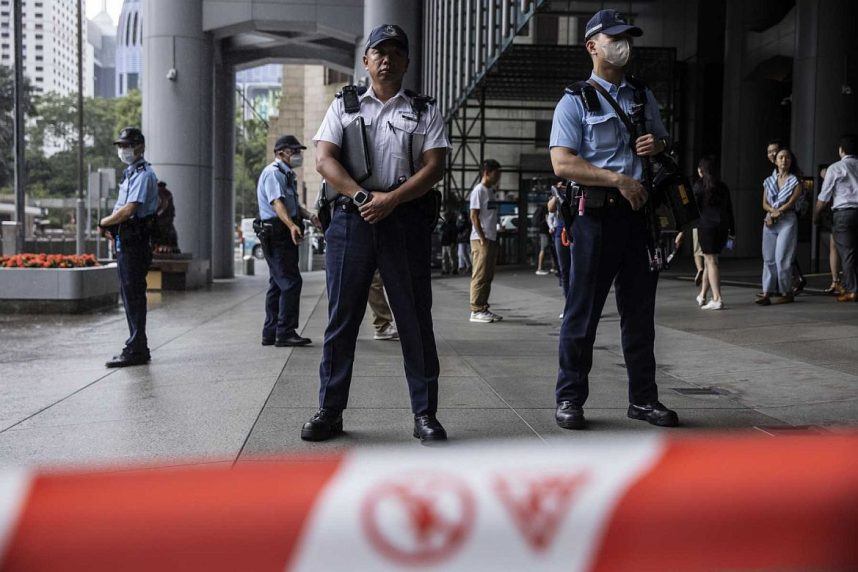 Hong Kong police officers standing guard