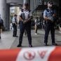 Hong Kong police officers standing guard