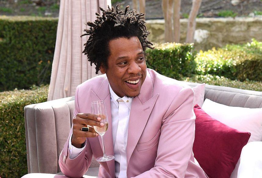 Music mogul and entrepreneur Jay-Z sips champagne