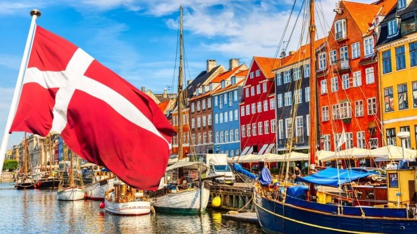 The Danish flag flying from a boat on the water