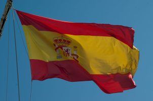 The Spanish flag flying on a makeshift mast