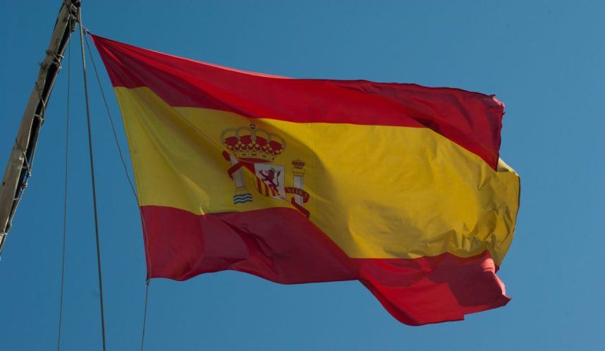 The Spanish flag flying on a makeshift mast