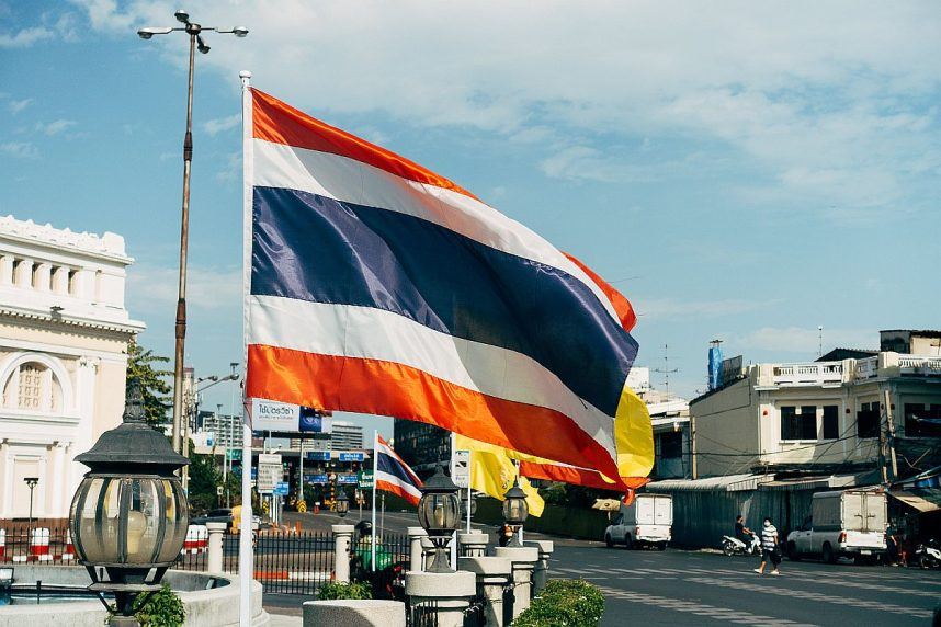 The Thai flag flying outside a building