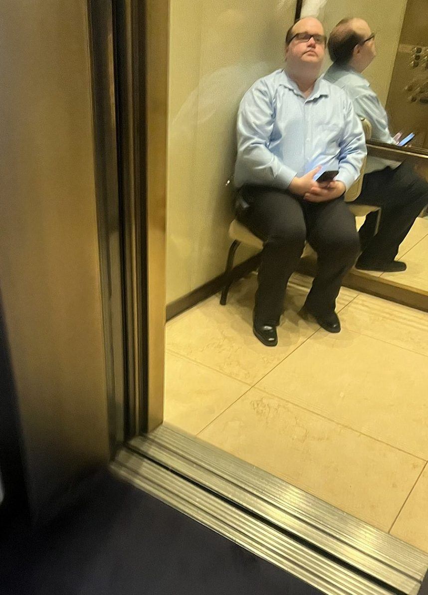 “random plain clothed people with walkie-talkies” seated in chairs riding all the elevators at Aria. 