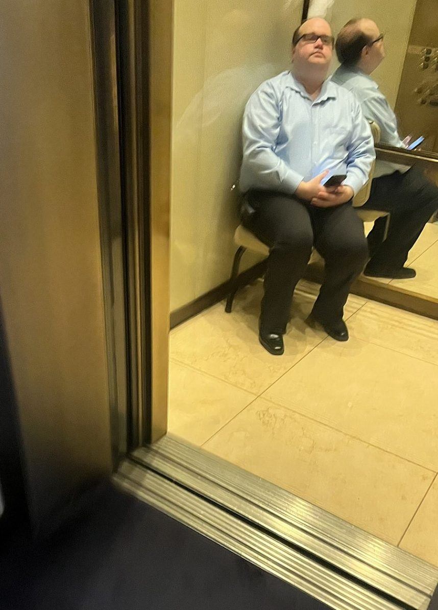 “random plain clothed people with walkie-talkies” seated in chairs riding all the elevators at Aria.