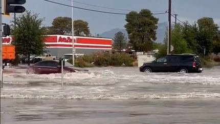 Flooded roads outside of an AutoZone in Las Vegas