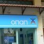 A sign displays the OPAP logo on a betting shop in Greece