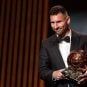Leo Messi accepting a Ballon d'Or award