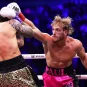 Logan Paul gives a glancing blow to the head of Dillon Danis in their boxing match