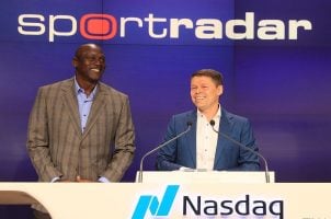 Michael Jordan and Sportradar co-founder and CEO Carsten Koerl in an appearance with NASDAQ during the launch of the company's IPO