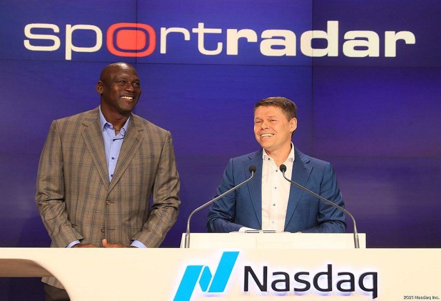 Michael Jordan and Sportradar co-founder and CEO Carsten Koerl in an appearance with NASDAQ during the launch of the company's IPO