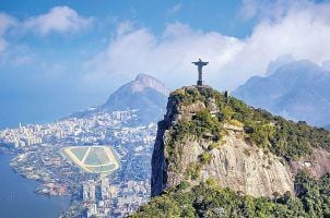 The Christ the Redeemer statue in Brazil overlooking Rio de Janeiro, Brazil.