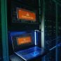 A mockup of a laptop showing a DDoS attack alert