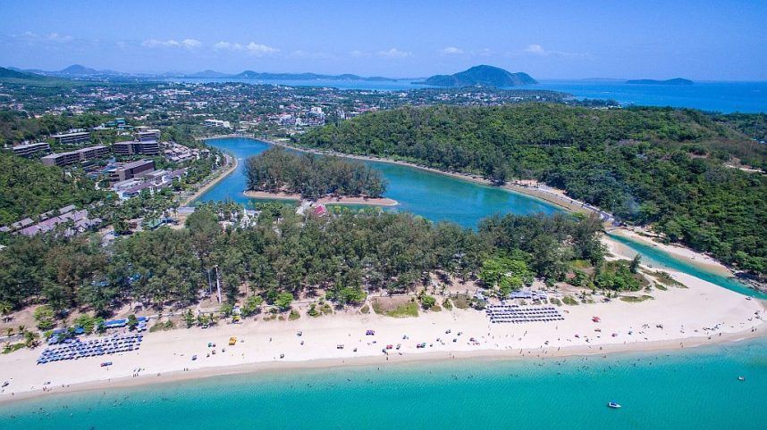 An aerial view of Nai Harn Bay and beach
