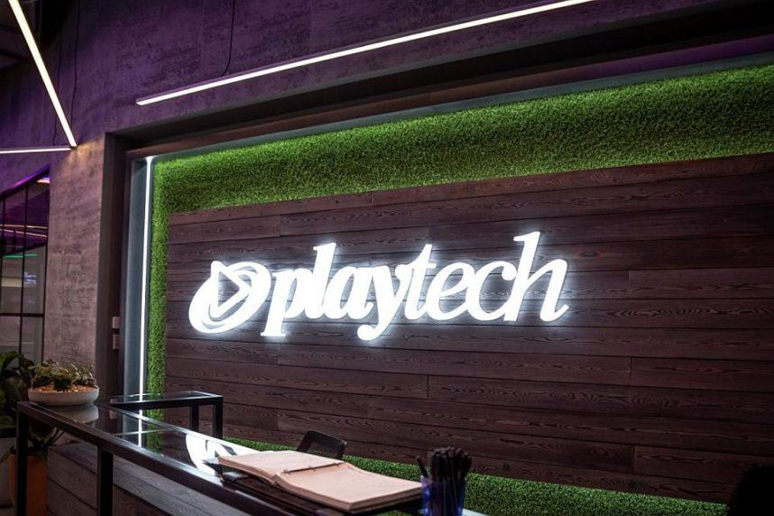 The Playtech logo behind a desk in the company's office