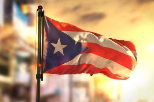 The Puerto Rican flag flying on a pole