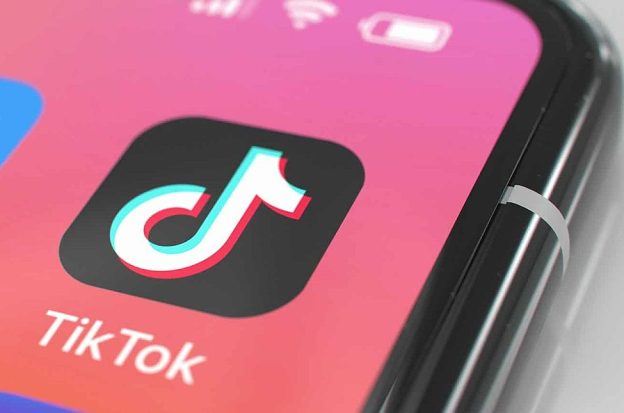 The TikTok icon on an iPhone screen