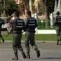 Well-armed Cambodian police officers on patrol