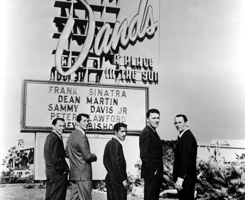 Frank Sinatra, Dean Martin, Sammy Davis Jr., Peter Lawford, and Joey Bishop pose in front of the Sands in Las Vegas in 1960.