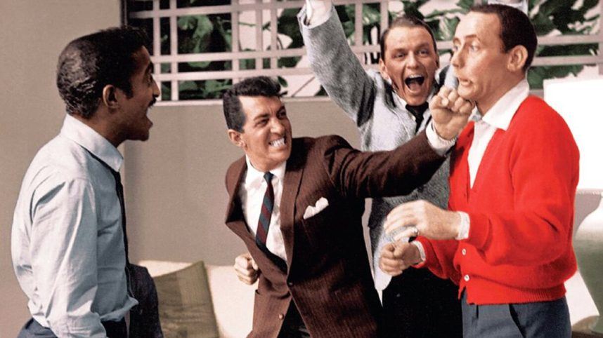 A colorized photo of Davis, Martin, Sinatra, and Bishop clowning around