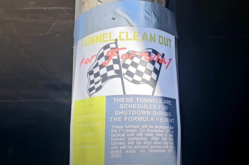 One of several signs warns unhoused people to find a new place to reside during the F1 Las Vegas Grand Prix