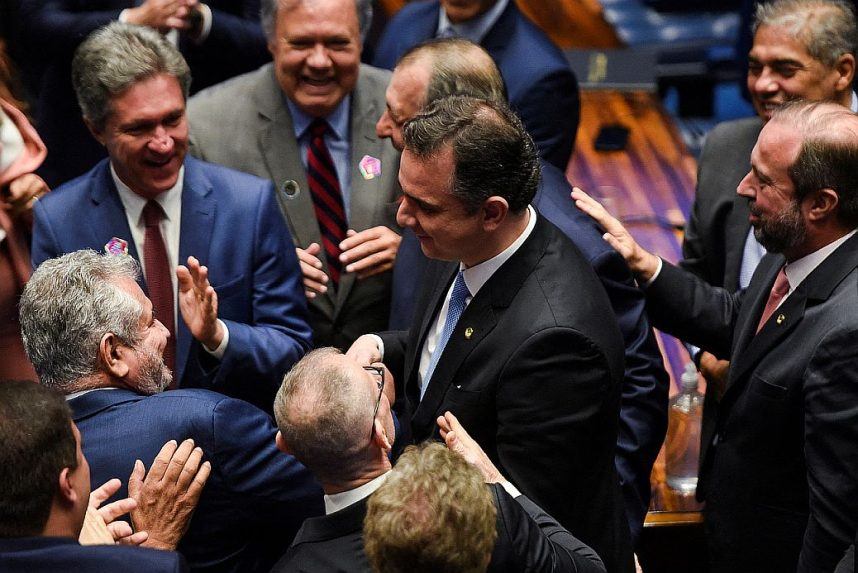 Brazilian senators celebrate during a session vote earlier this year