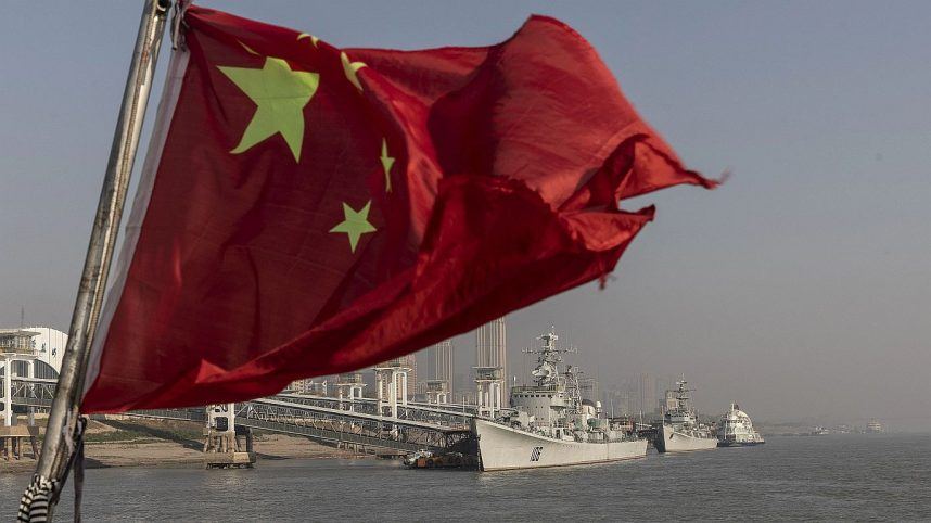 The Chinese flag flying from a ship