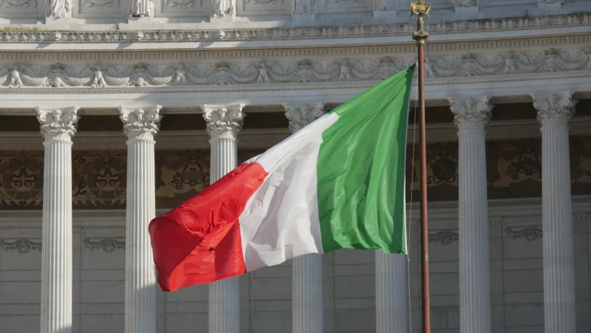 The Italian flag in front of the Victor Emmanuel II National Monument in Rome