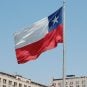 The flag of Chile flying on a flagpole