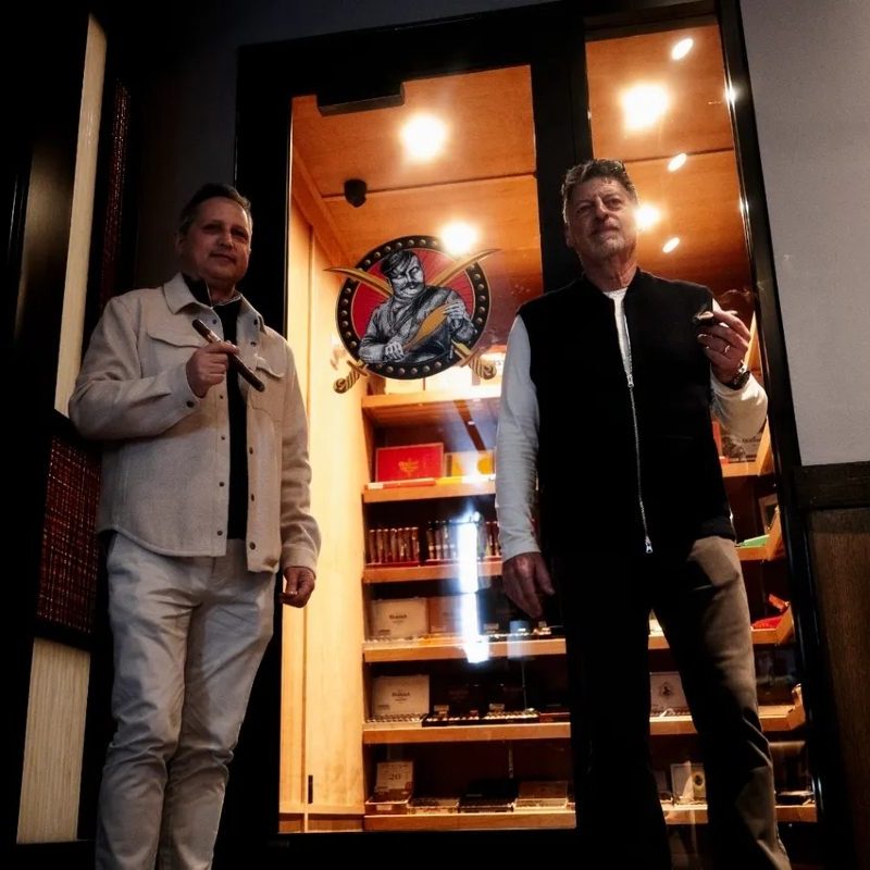sachin and babi light blue dress Club Macanudo | White Collar Wiki
